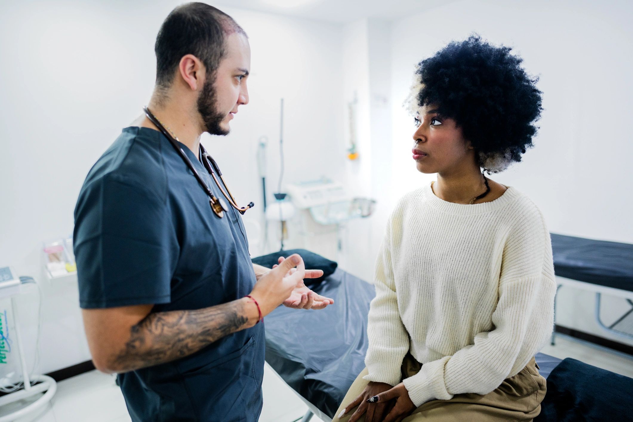 Doctor talking with a patient in a modern clinic